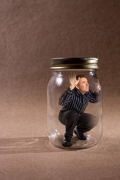 33 555ml Round Gherkin Jar NZ 0. . Man sits on glass jar